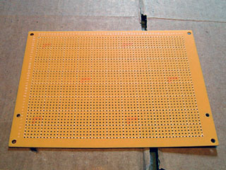 Two new holes for PCB spacers