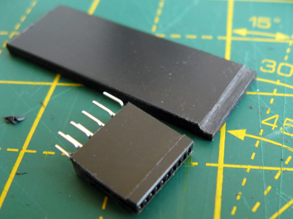 Groove filed into the end of the piece for the raised ridge on the PCI Express slot