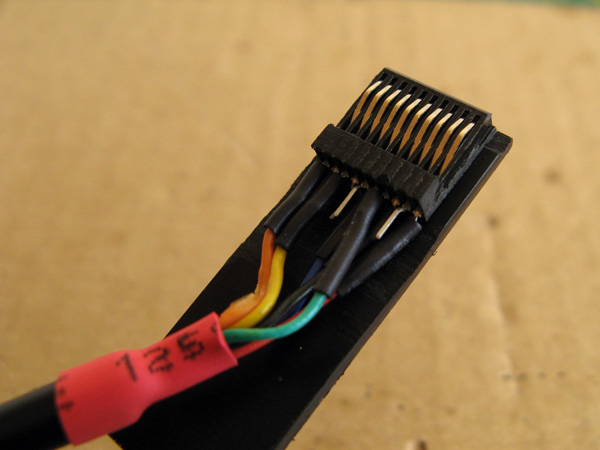 The connector is now glued to its supporting backing