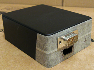 Upper VGA socket hole widened sufficiently to accomodate a VGA connector
