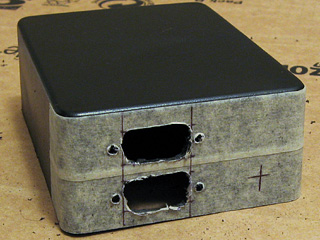 Both VGA socket holes widened, with holes for the jack posts drilled