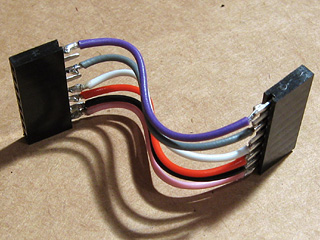 Connector cable bent to fit