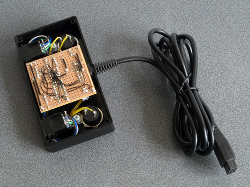 The various component parts assembled inside the enclosure