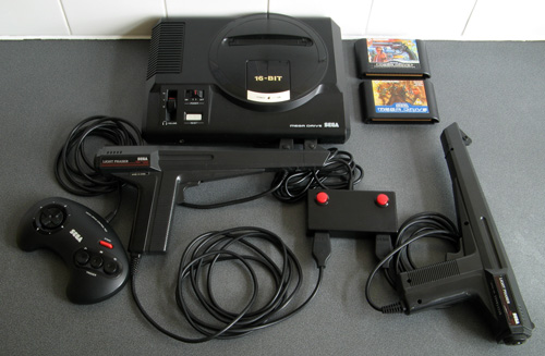 The finished adaptor, plugged into a Mega Drive and all ready to play