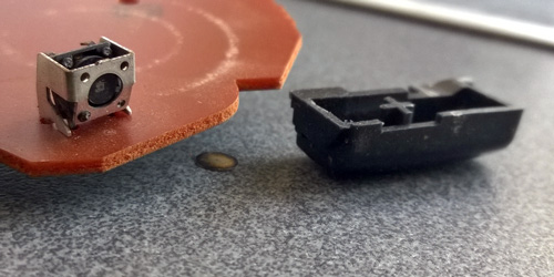 Broken 'Mode' tactile switch and damaged plastic button