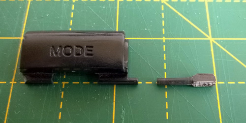 A size comparison between the new peg and the missing peg