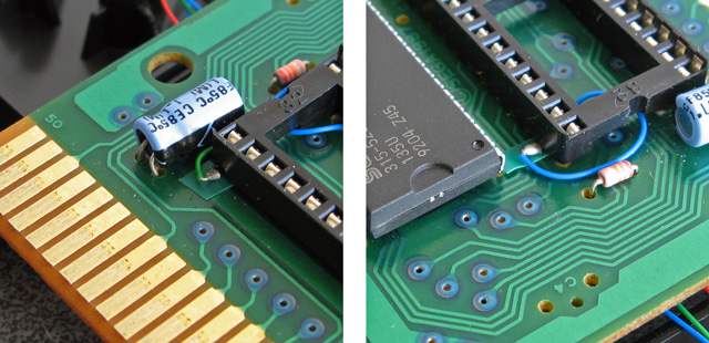 Close-up detail of the bent pins and soldered wires of the IC socket